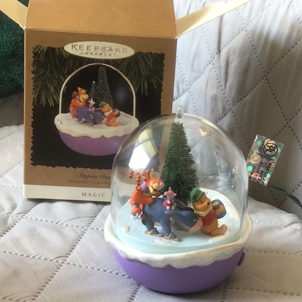 Hallmark Keepsake ornament Winnie Pooh. Slippery Day. Motion. New in box.